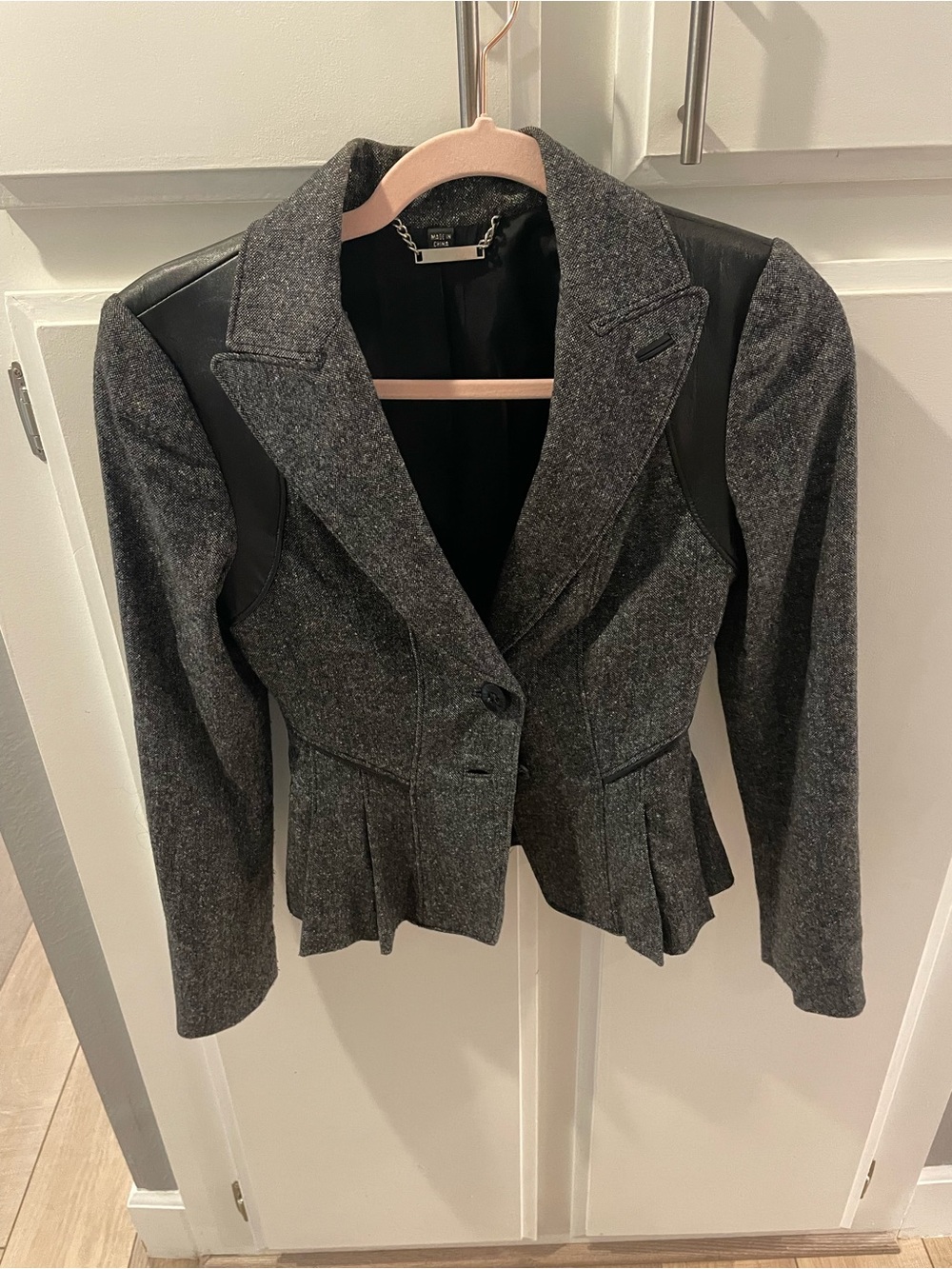 Bebe Woman’s grey wool/polyester blazer, size 0